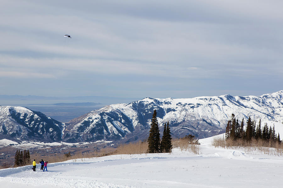 Nature Digital Art - Three People Flying A Kite In Winter Landscape, Eden, Utah, Usa by Samantha Mitchell