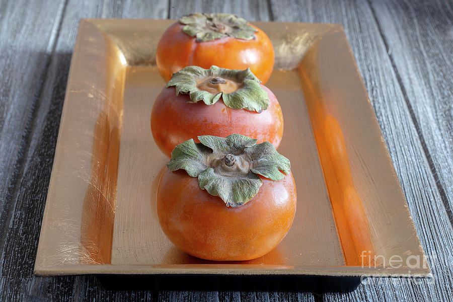 Fruit Photograph - Three Persimmons by Elisabeth Lucas