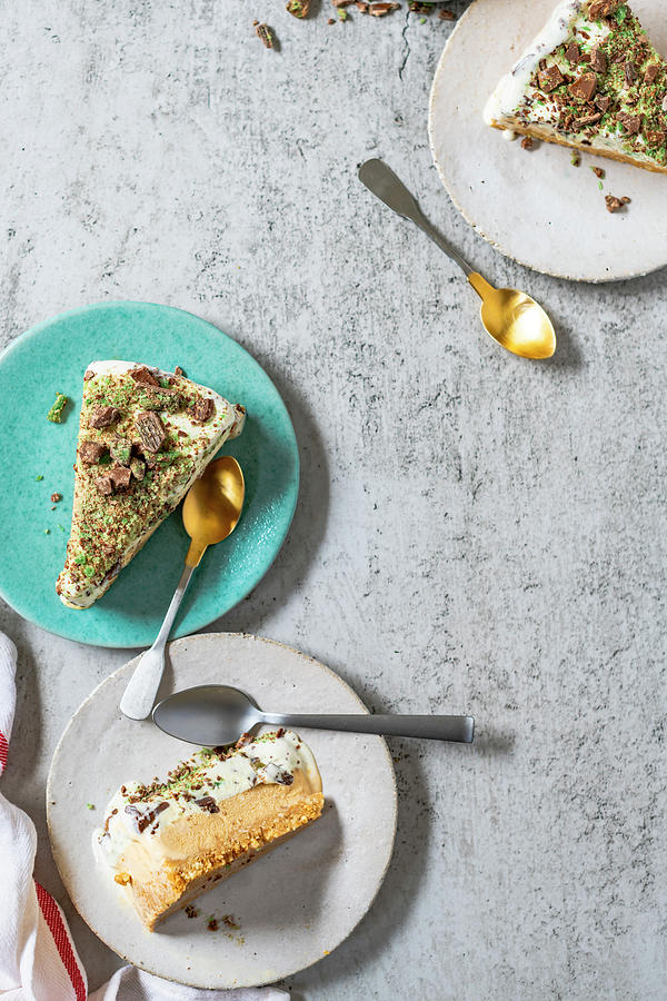 Three Pieces Of Ice Cream Cake With Pistachios Photograph by Hein Van Tonder