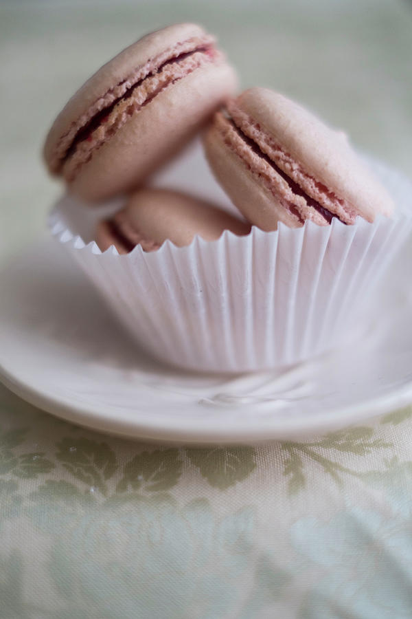 Three Pink Macarons In A Paper Cup Photograph by Eising Studio