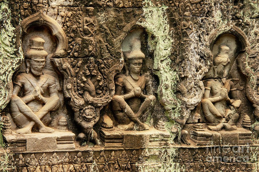 Three Preah Khan Temple Carvings Photograph by Bob Phillips