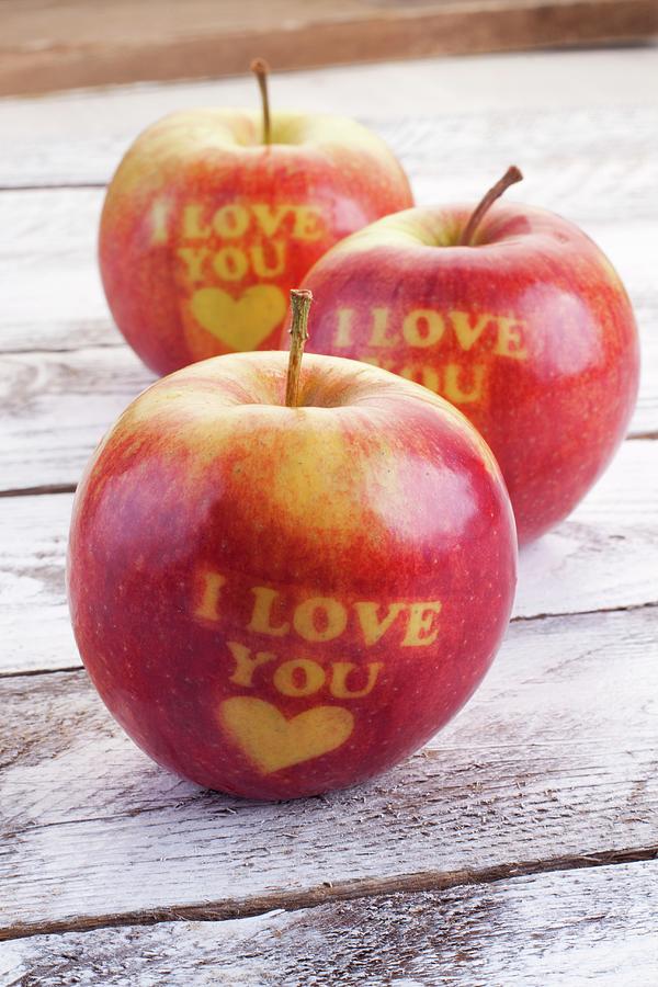 Three Red Apples Carved With Hearts And The Words i Love You Photograph by Wawrzyniak.asia