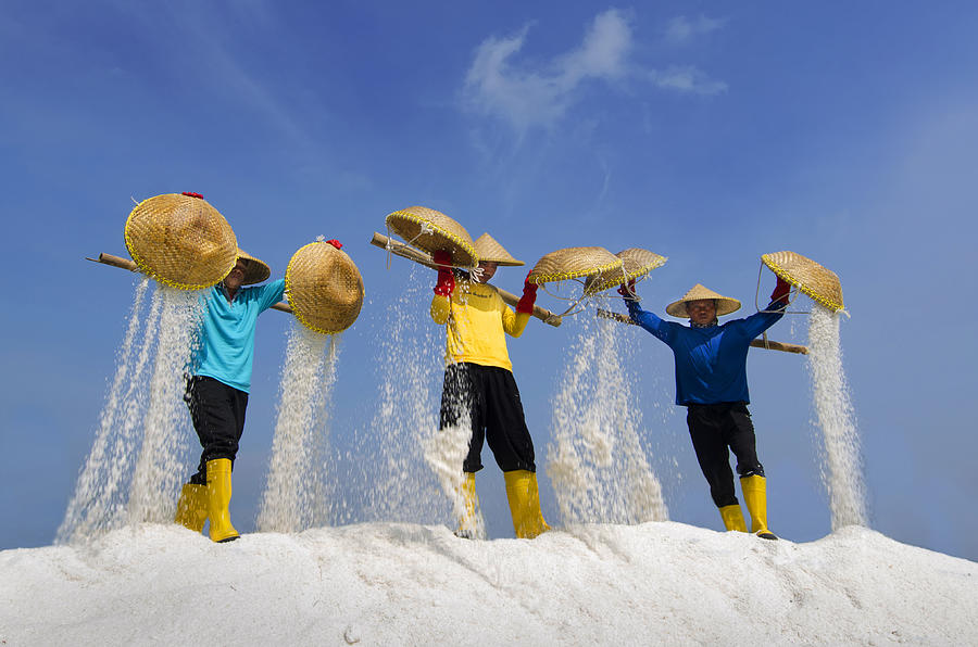 Three Salt Farmers Photograph by Rawisyah Aditya