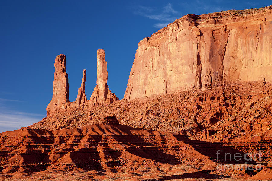 Three Sisters - Monument Valley Photograph by Brian Jannsen