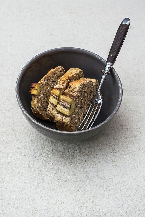 Three Slices Of Gluten-free Banana Bread With Chia Seeds In A Bowl Photograph by Leah Bethmann