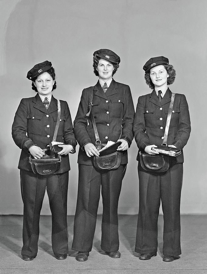 Three unidentified women tram conductors in uniform with leather ticket pouches, probably taken duri Painting by Celestial Images