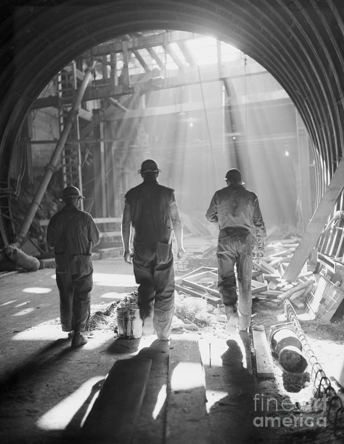 Three Workers Entering Tunnel Photograph by Bettmann