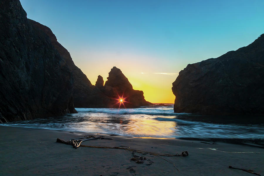 Sunset Photograph - Through the Keyhole by Peter Tellone