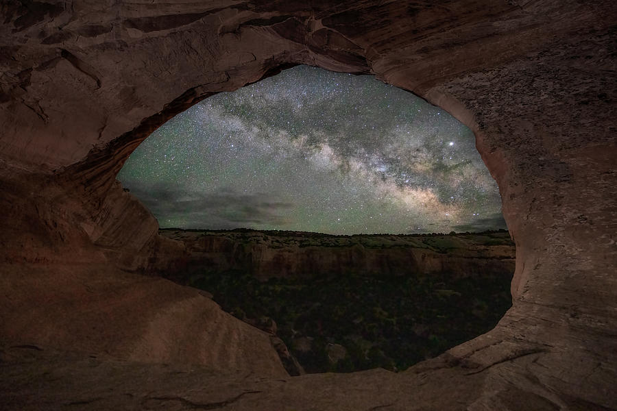 Through The Rock Eye Photograph by Jun Zuo