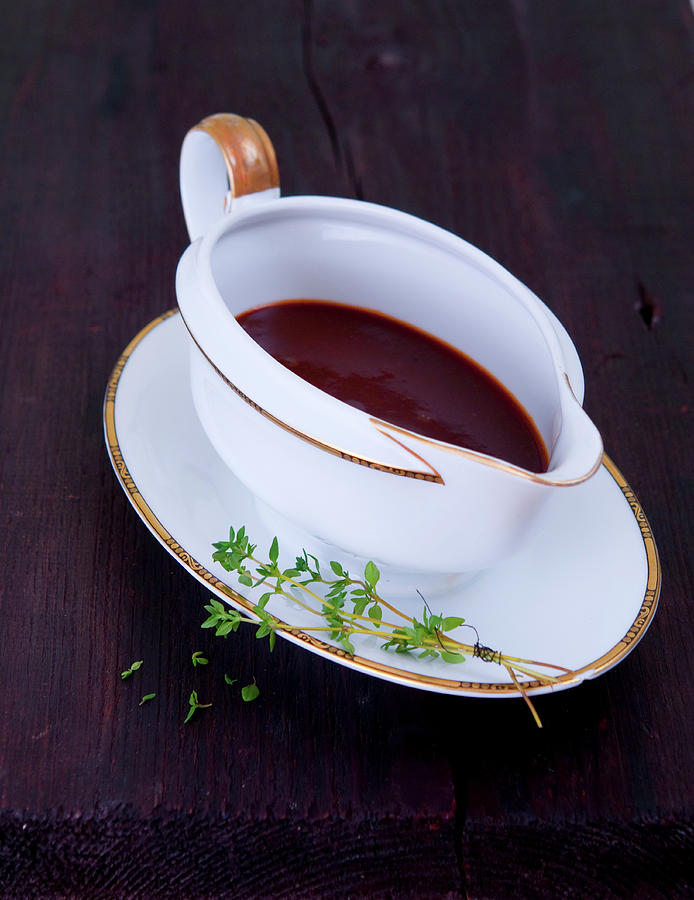 Thyme Jus In A Gravy Boat Photograph by Udo Einenkel