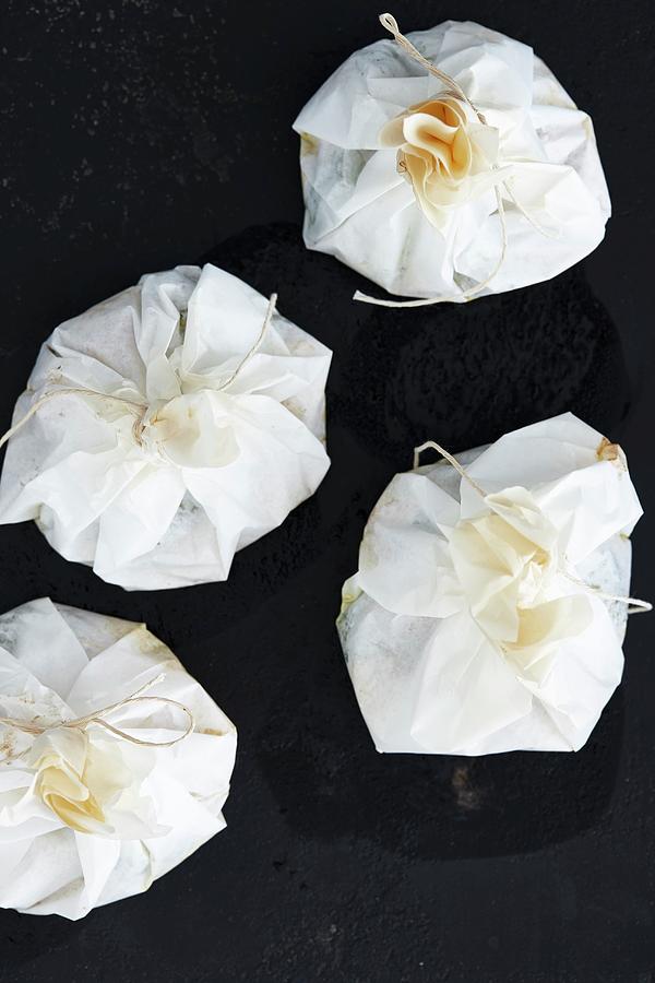 Tied Parchment Paper Packets Photograph by Misha Vetter