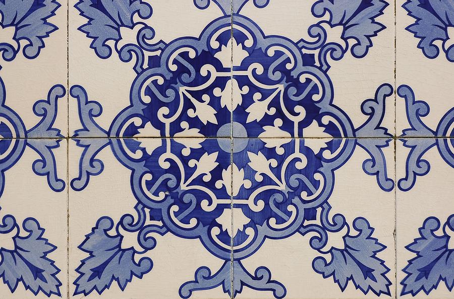 Tiles with geometric and plant motifs located in the Town Square, Castro Verde. Alentejo. Portugal. Drawing by Album
