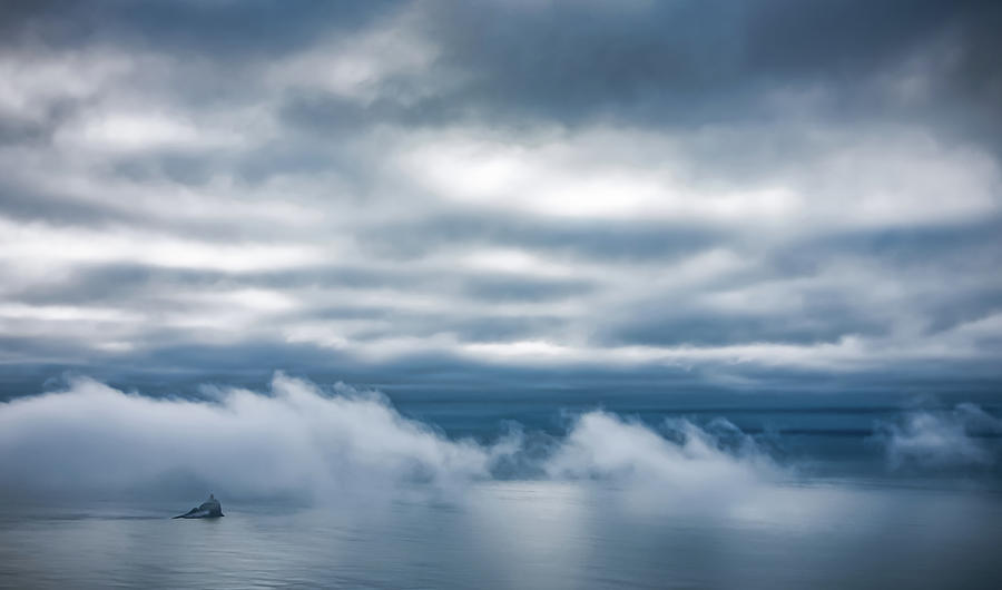 Tillamook Rock Lighthouse in the Clouds Photograph by Don Schwartz