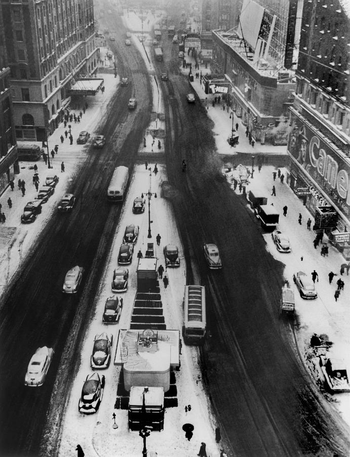 Times Square Covered In Snow In The Photograph by Keystone-france