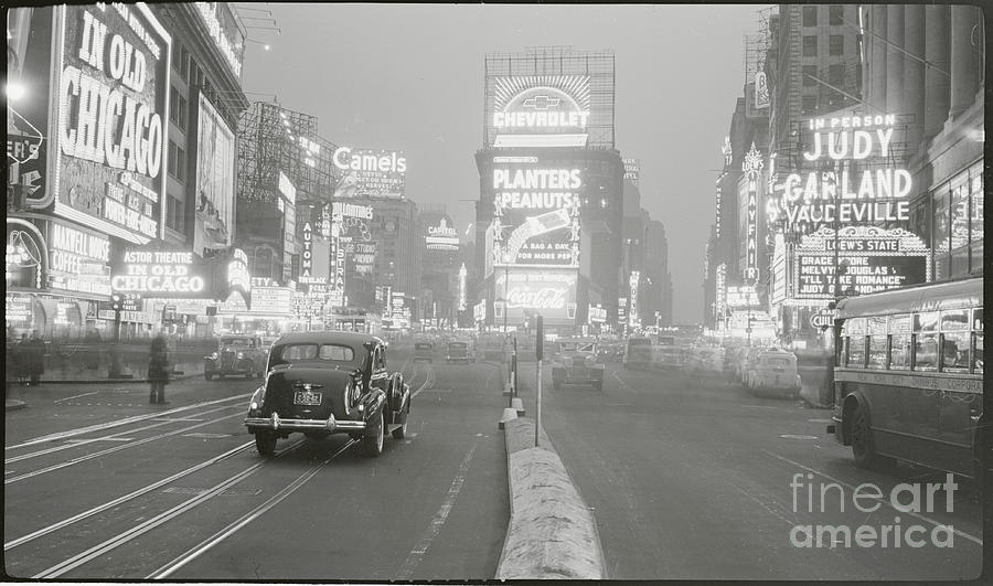Times Square Illuminated By Large Neon Photograph by Bettmann