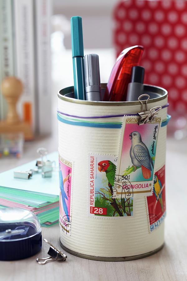 Tin Can Decorated With Postage Stamps With Bird Motifs Used As Pen Holder Photograph by Franziska Taube
