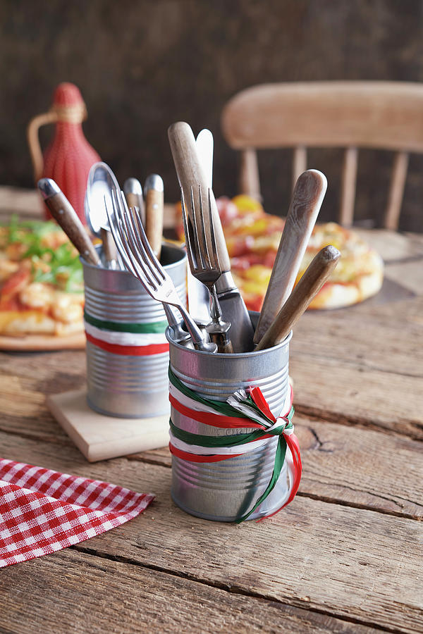 Tins Of Cutlery On A Rustic Wooden Table Photograph by Jan-peter Westermann
