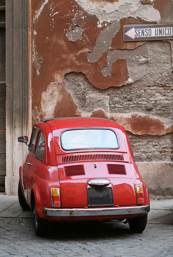 Tiny Red Vintage Car Parked In Rome Photograph by Romaoslo