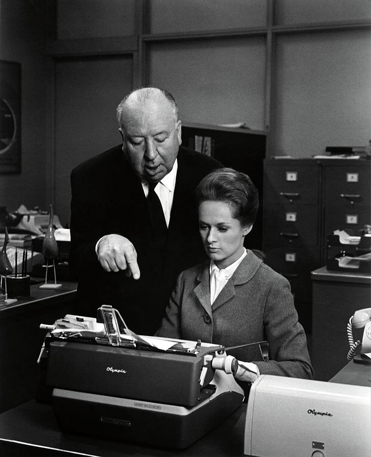 TIPPI HEDREN and ALFRED HITCHCOCK in MARNIE -1964-. Photograph by Album