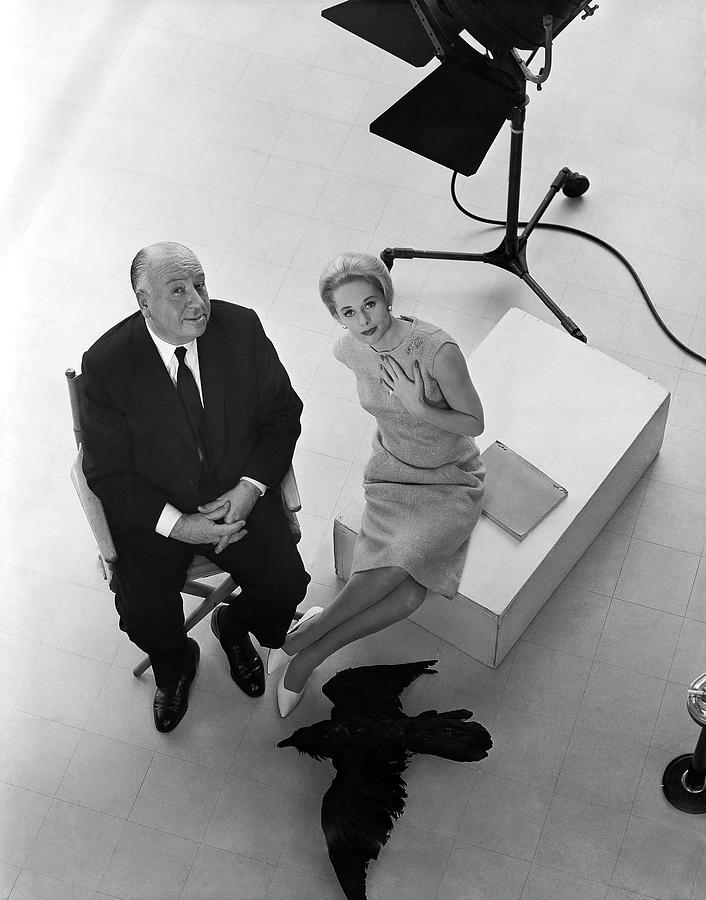 TIPPI HEDREN and ALFRED HITCHCOCK in THE BIRDS -1963-. Photograph by Album