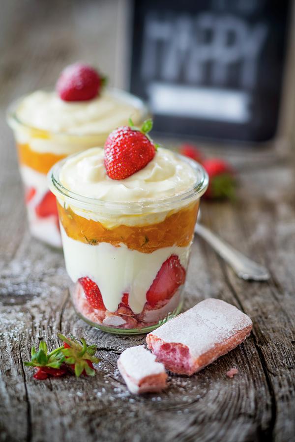 Tiramisu With Strawberries And Apricots And Thyme Compote Photograph by Jan Wischnewski