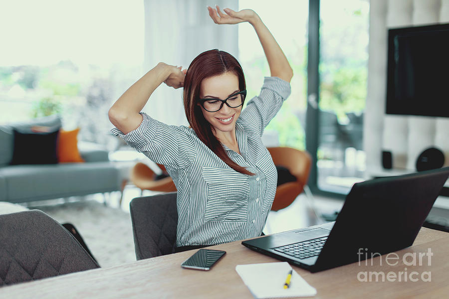 Tired Businesswoman Stretching Photograph by Sakkmesterke/science Photo Library
