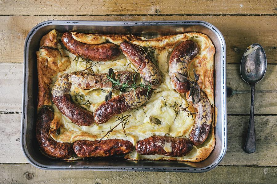 Toad In The Hole sausages Baked In Batter, England Photograph by Nick Sida