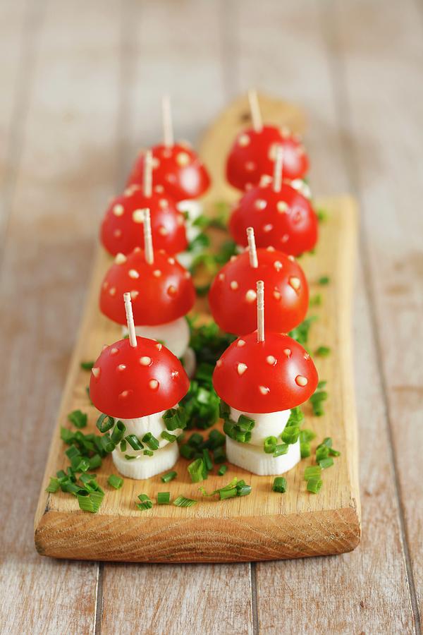 Toadstools Made From Cherry Tomatoes And Mozzarella, With Sliced Chives And Spots Of Mayonnaise Photograph by Rua Castilho