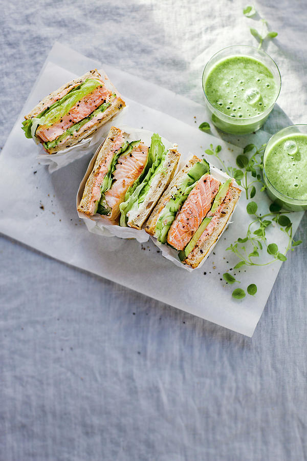 Toast Sandwich With Salmon, Cucumber, Avocado, Caviar And Creamcheese, Served With Green Smoothy Photograph by Giedre Barauskiene