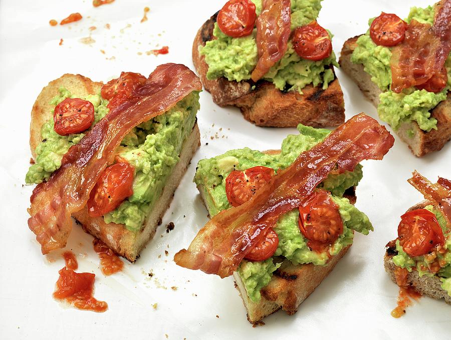 Toast Topped With Bacon, Guacamole And Tomatoes Photograph by Hugh Johnson