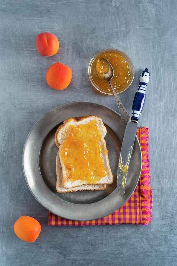 Toast With Apricot Jam Photograph by Mandy Reschke
