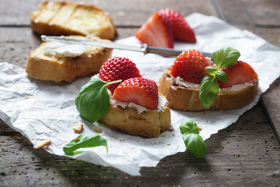 Toasted Baguette Slices With Almond Cream Cheese, Strawberries And Basil vegan Photograph by Kati Neudert