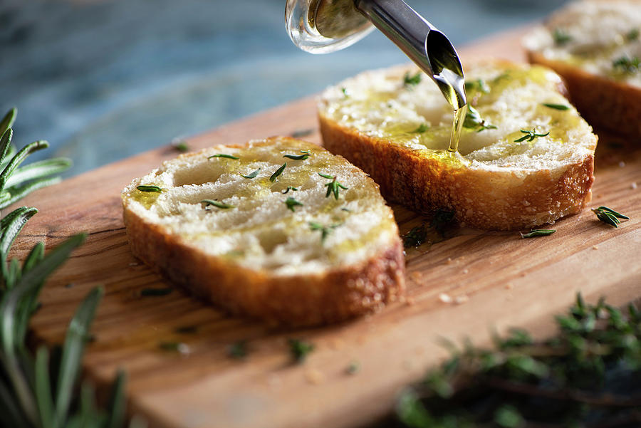 Toasted Bread With Olive Oil And Thyme Photograph by Jillian Graniero