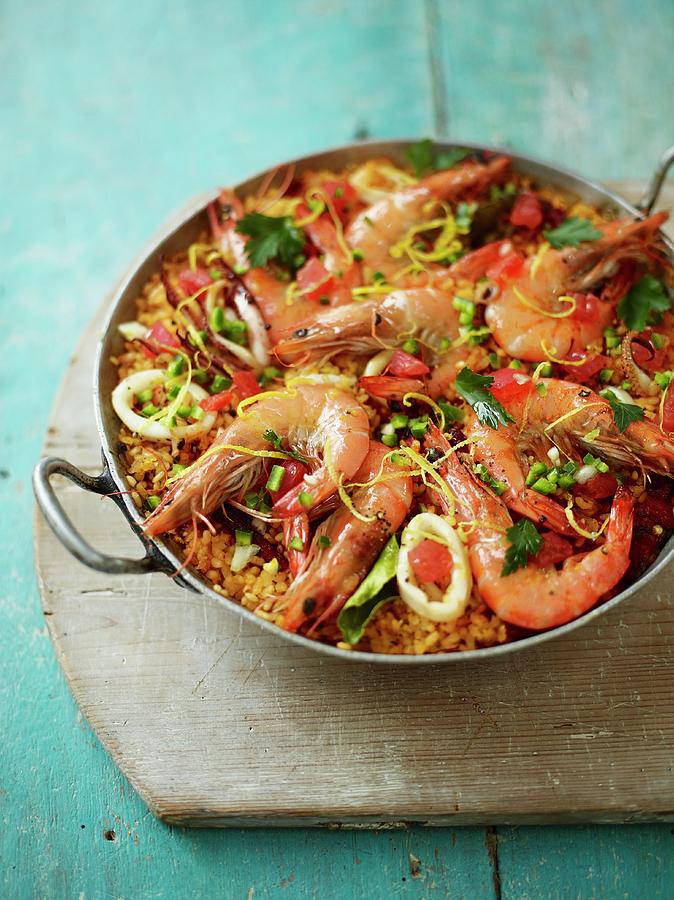 Toasted Paella With Red Prawns And Black Pepper Squid Photograph by Dan Jones