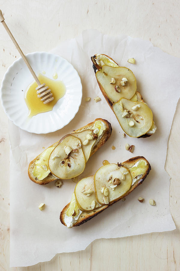 Toasts With Camembert Cheese, Pears, Walnuts And Honey Photograph by Zuzanna Ploch