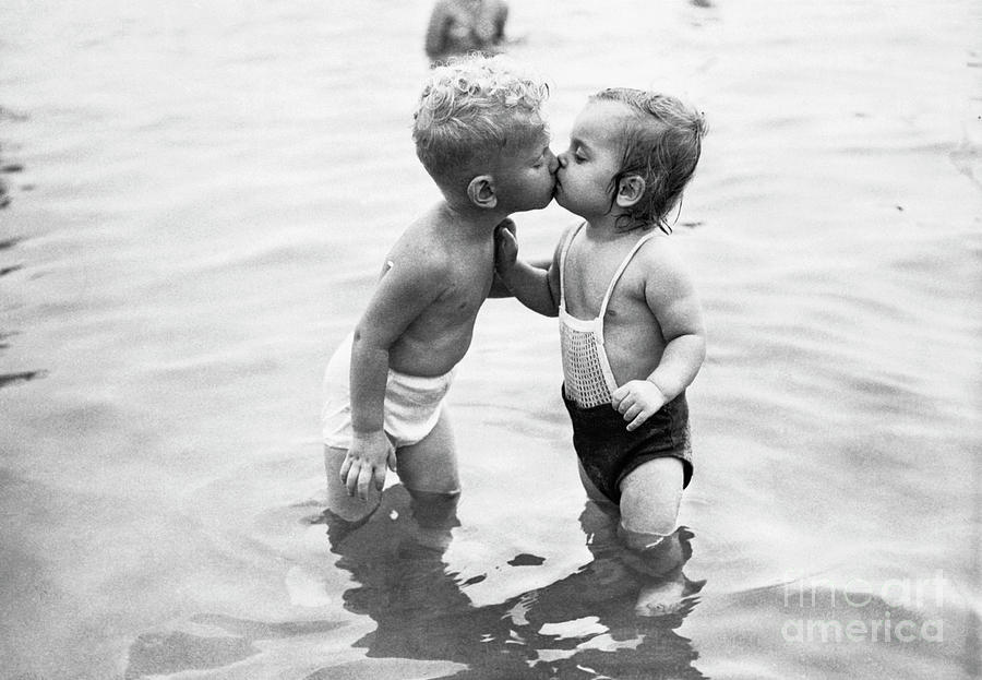 Toddlers Kissing In Lake Michigan Photograph by Bettmann