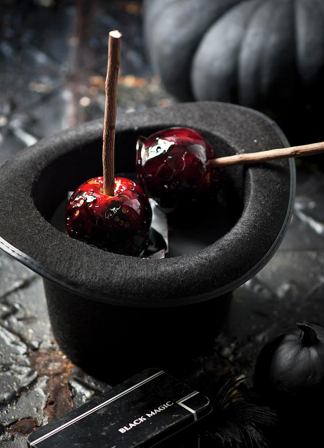 Toffee Apples In A Black Hat Photograph by Great Stock!