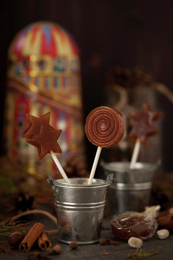 Toffee Lollipops Standing Up In A Metal Bucket Photograph by Jane Saunders