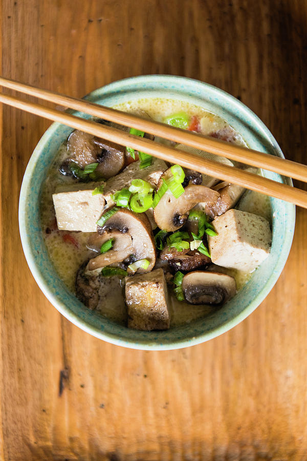Mushroom Photograph - Tofu And Mushroom Soup In Blue Bowl With Chopsticks Closeup by Cavan Images
