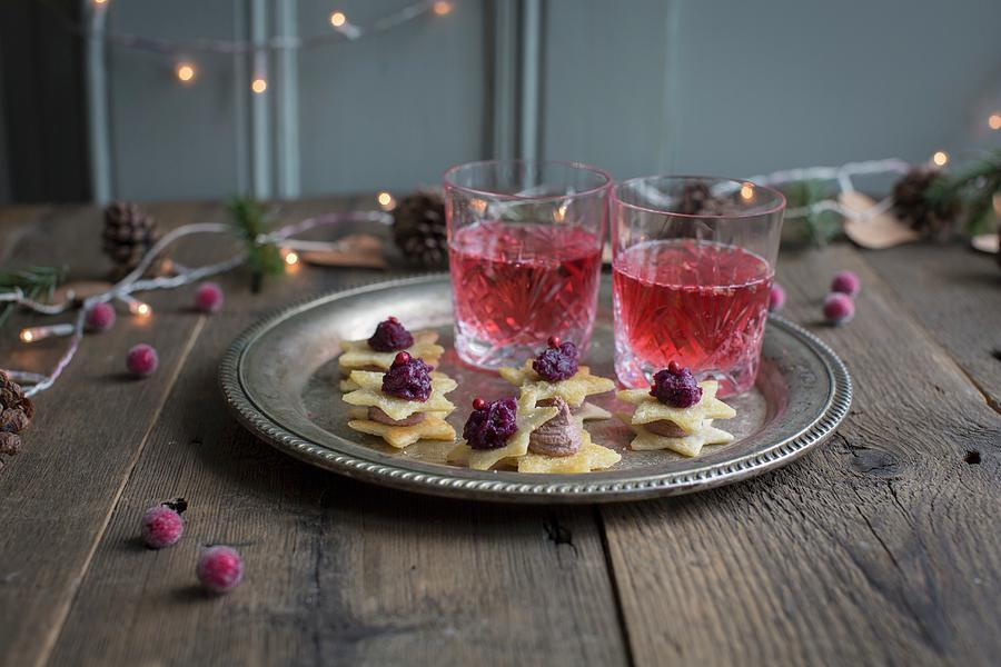 Tokyo Manhattan Cocktail Made With Cranberry Juice Serve With Puff Pastry Stars Topped With Chicken Liver Pt And Red Onion Confit christmas Photograph by Anne Faber