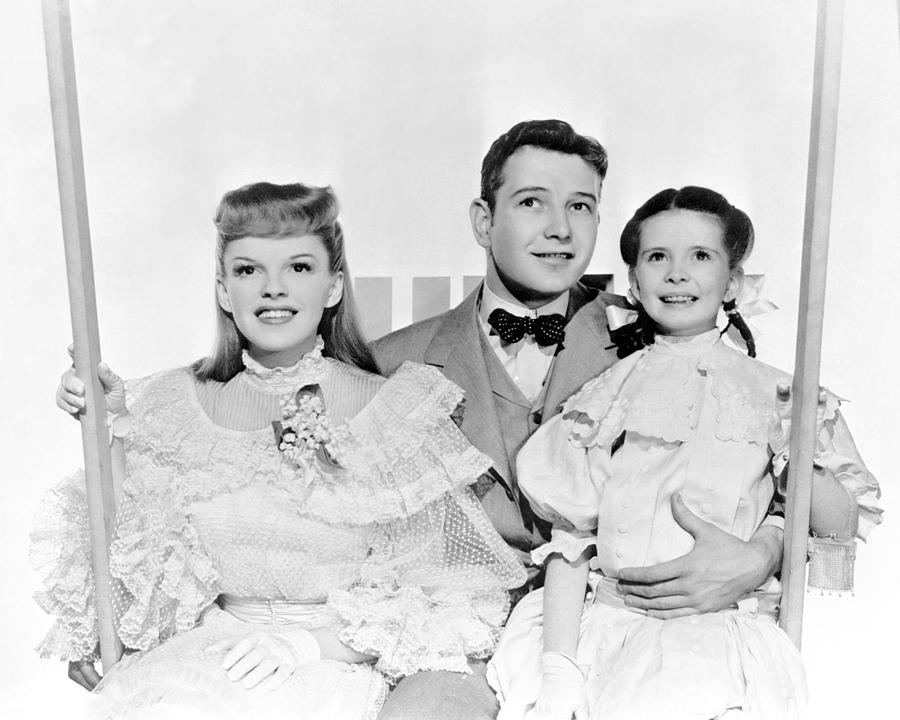 Judy Garland Photograph - Tom Drake, Judy Garland And Margaret Obrien Sitting On Swing by Globe Photos