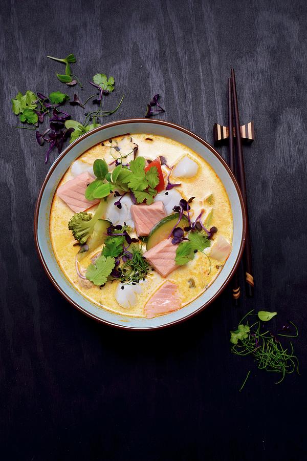 Tom Kha Soup With Salmon, Cod, Broccoli, Zucchini, Coriander And Sprouts thailand Photograph by Elli Briest