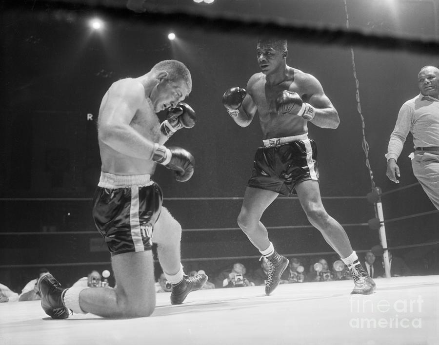 Tom Mcneeley On Knee In Fight Photograph by Bettmann
