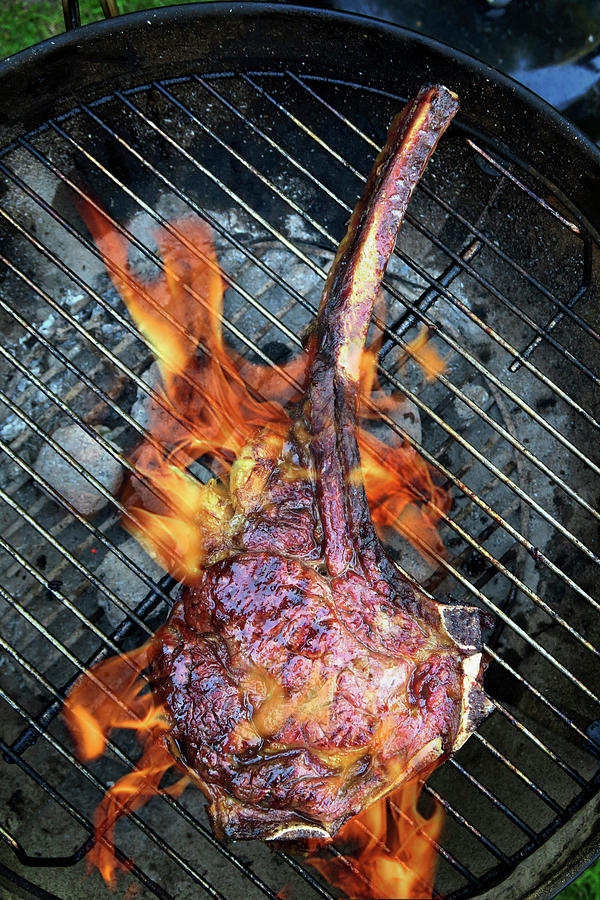 Tomahawk Beef Steak On A Grill top View Photograph by Petr Gross