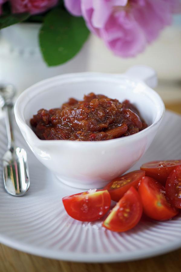 Tomato Chutney In A Sauce Dish Photograph by Winfried Heinze