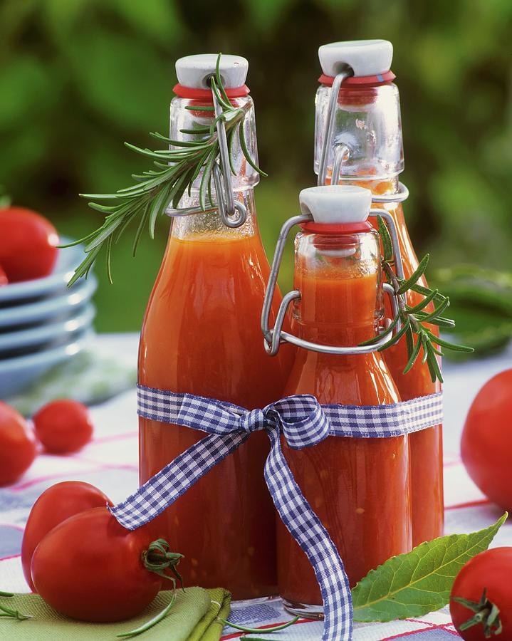Tomato Juice In 3 Flip-top Bottles, Tomatoes, Rosemary, Bay Photograph by Strauss, Friedrich