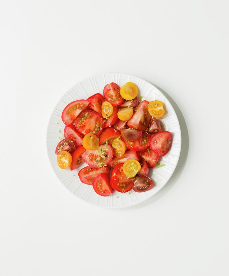 Tomato Salad Made From Different Types Of Red And Yellow Tomatoes Photograph by Colin Cooke