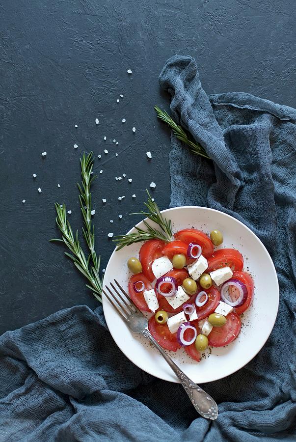 Tomato Salad With Olives, Feta And Onion Photograph by Sonya Baby