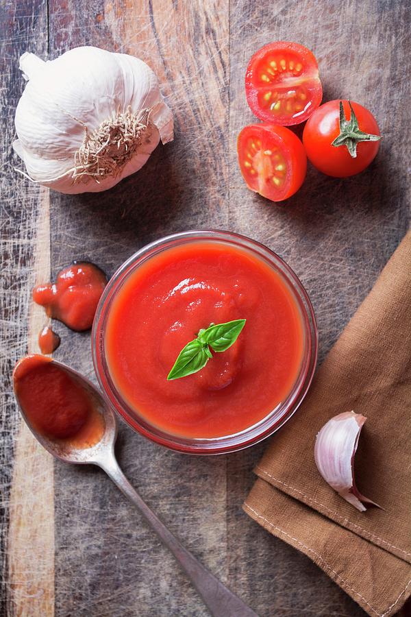 Tomato Sauce And Ingredients Photograph by Marya Cerrone