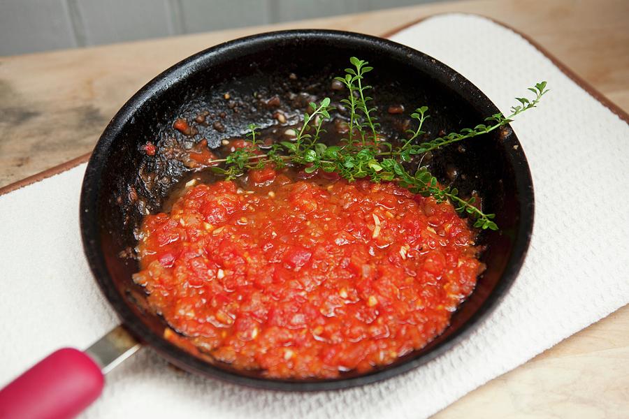 Tomato Sauce With Oregano In A Pan Photograph by Rene Comet